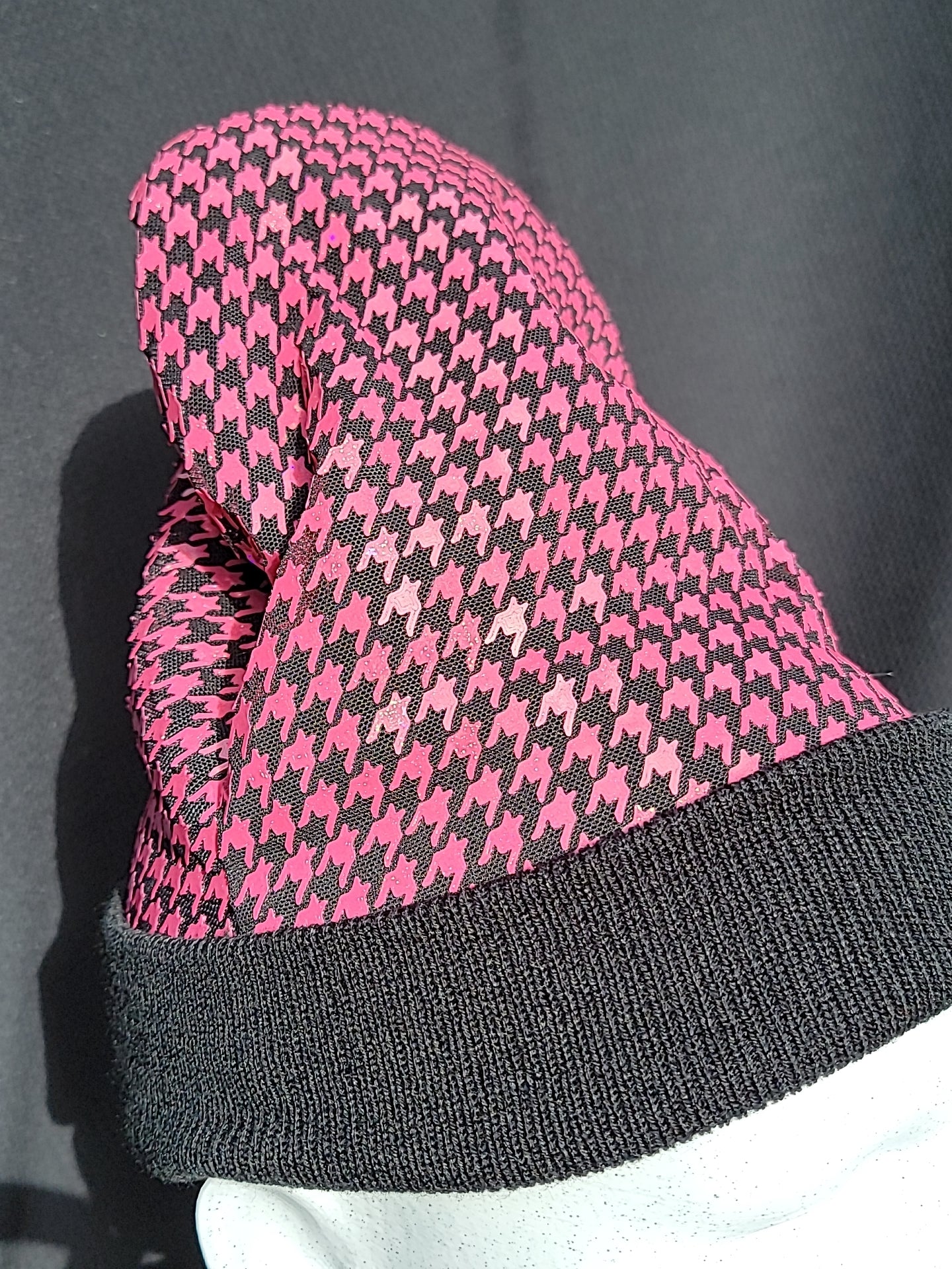 Pink with rainbow finish on a black hat